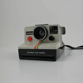 1970's Polaroid SX-70 OneStep Rainbow Land Camera. Camera, V