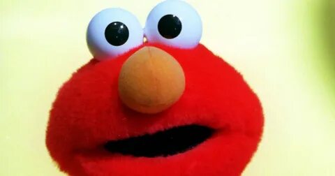Furless Tickle Me Elmo sent from the fiery depths of hell is