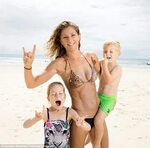 Gold Coast mothers take to the beach to perform acro yoga wi