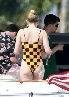 SOPHIE TURNER in Swimsuit at a Boat in Miami 03/25/2019 - Ha