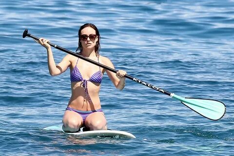 Olivia Wilde on the beach and in the water in Hawaii - May 2