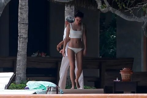emma watson relaxes in a white bikini during her vacation in