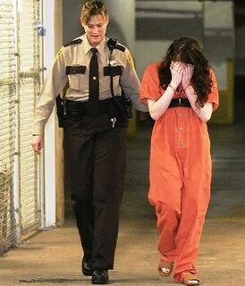 Escorting a prisoner to jail after her sentencing. Prison ju
