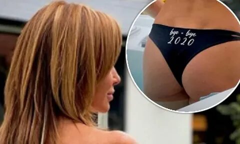 Amanda Holden, 49, poses TOPLESS in cheeky 'bye bye 2020' un