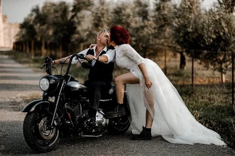 Wedding couple kissing on a motorcycle Motorcycle wedding pi