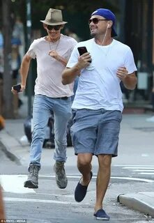 Leonardo DiCaprio giggles while being chased by Lukas Haas i