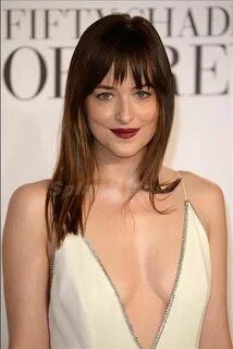 Dakota Johnson dares to bare at the Fifty Shades of Grey Pre