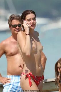 Barbara Opsomer topless at the beach in Saint-Tropez, August