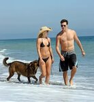 Ali Larter and Hayes MacArthur on the beach with her dogs! M