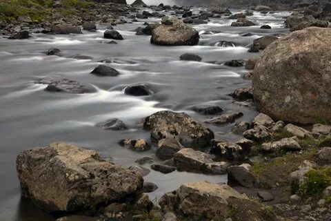 Landscape with the stones in the water of waterfall free ima