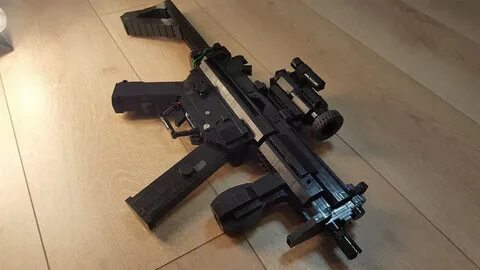 MP5Kurz w/ Folding stock and Aimpoint Comp M2 Brick Armory F