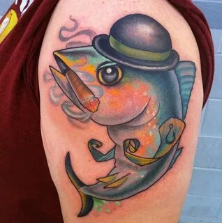 Cute fish with cap tattoo on shoulder - Tattoos Book - 65.00