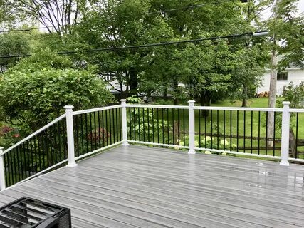 Our deck... Trex Island Mist decking with white and black al
