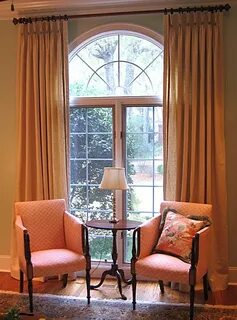 Simple side panels with sheer light control Palladian window