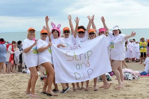 Hundreds of women strip off for cancer charity skinny dip Sh