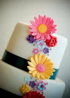 Multi coloured gerbera daisy wedding cake Fancy wedding cake