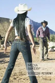 Mediabakery - Photo by Blend Images - Young couple in cowboy