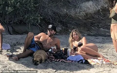 Topless Brody Jenner hits crowded Malibu beach with new woma