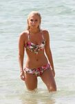 Tulisa Contostavlos in a bikini on the beach in Honolulu Jul