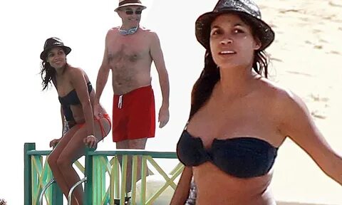 Rosario Dawson sunbathes topless in Barbados with boyfriend 