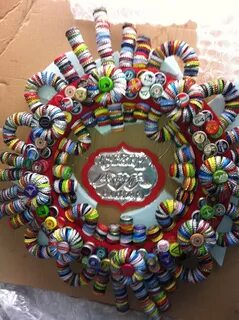 Pam made this bottle cap art for Melanie and Nick's wedding 