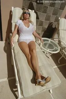 Cheeky milf Wifey showing juicy melons at the pool and eatin