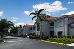 Отель Holiday Inn Palm Beach - Airport Conference Center (Уэ