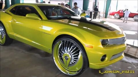 Candy lime Camaro on 28 inch floaters at Florida Classics in