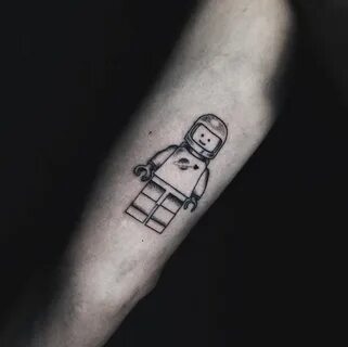 Astronaut floating in space tattoo Lego tattoo, Astronaut ta