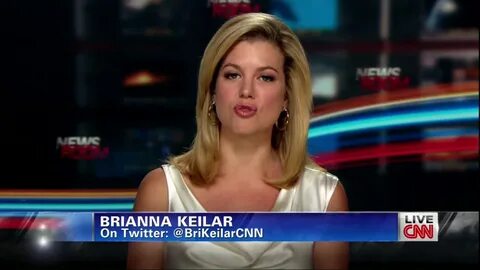 Ladies in Satin Blouses: Brianna Keilar - white satin dress/