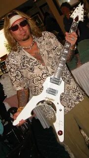 File:Mötley Crüe's Vince Neil with Jay Turser Warlord guitar