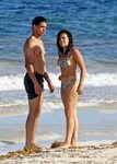 Gina Rodriguez wears cheeky bikini with fiance Joe LoCicero 
