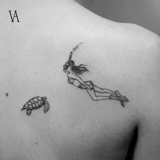 Fine line style turtle and diver tattoo on the right Small t
