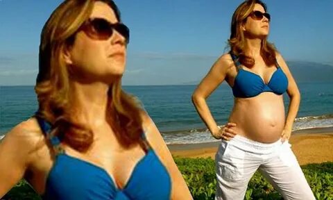 Jenna Fischer shows off her bulging belly and bosom while on