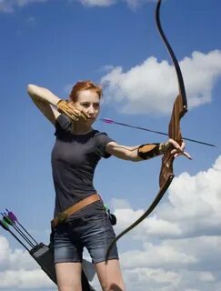 Archery woman bends bow archer target narrow Stock Photo by 