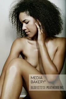 Mediabakery - Photo by Blend Images - Nude mixed race woman 