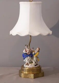 Vintage romantic lamp with porcelain figurine. 24worldmedia 