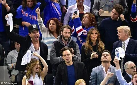 Liam Neeson cheers on the New York Rangers at the Stanley Cu