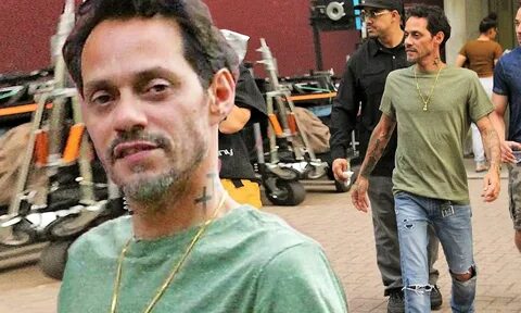 Marc Anthony displays neck tattoo while filming In the Heigh