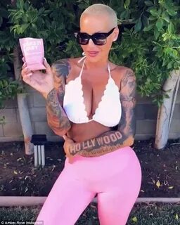 Amber Rose exhibits her cleavage and toned stomach on Instag