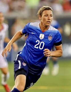 Abby Wambach #20 of the United States runs during the friend