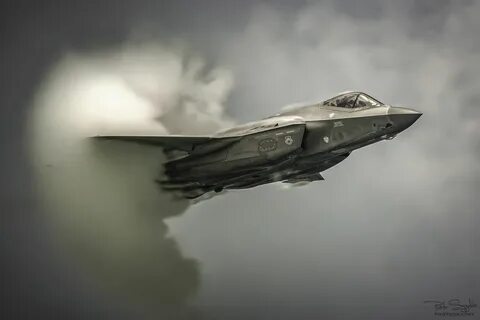 F-35 Lightning II breaking the sound barrier. Military aircr