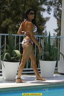 Danielle Staub caught in bikini by the pool