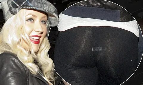Christina Aguilera flashes G-string in see-through tights
