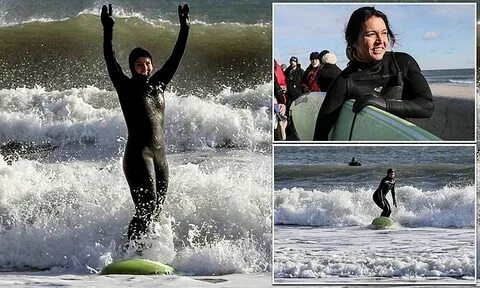 Tulsi Gabbard surfs in NEW HAMPSHIRE in 'winter wetsuit' Dai