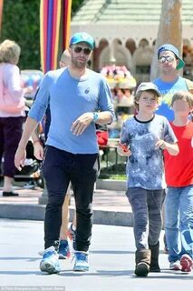 Chris Martin enjoys time with son Moses in Disneyland