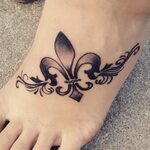 Fleur De Lis foot tattoo Fleur de lis tattoo, Wrist tattoos 
