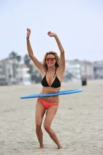 Estella Warren in a bikini with a hula hoop in Venice Beach 