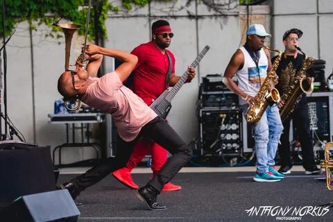 Trombone Shorty flouts rain to uncork crowd-shaking musical 