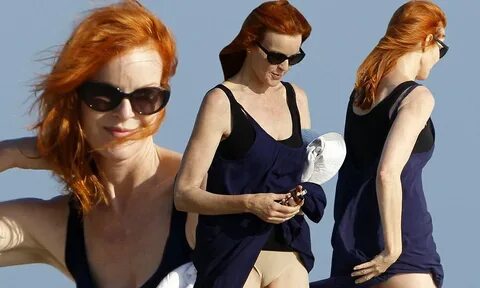 Marcia Cross' dress blows up to expose nude underwear during